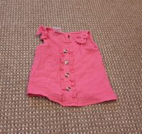 Bright pink top – washed but never worn
