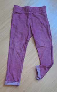 Long leggings/pants (some pulling visible)